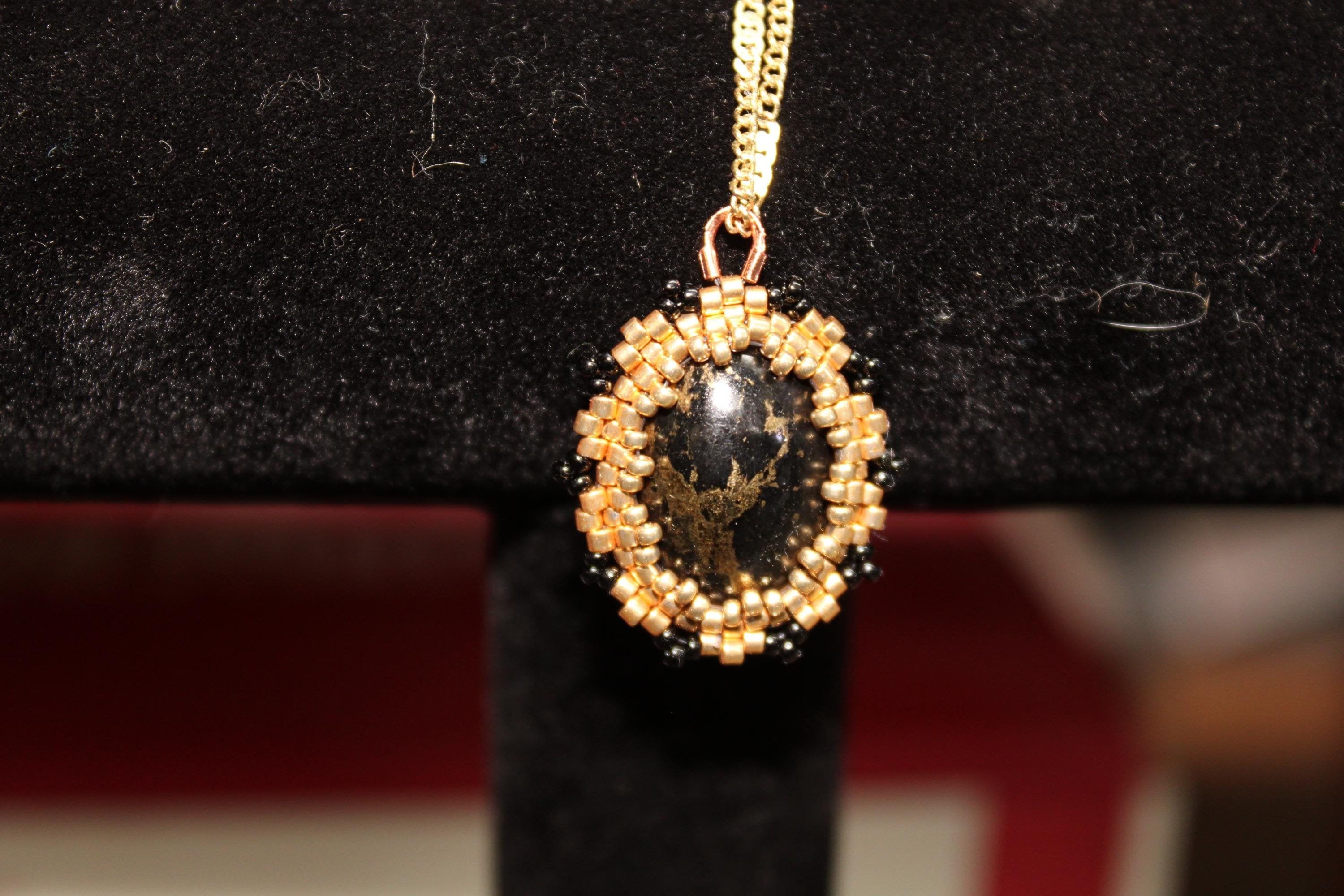 Apache Gold Pendant Necklace